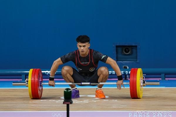 Lifter China Shi Zhi Yong Gagal di Clean & Jerk, Rizki Ukir Tinta Emas di Olimpiade 2024 Paris
