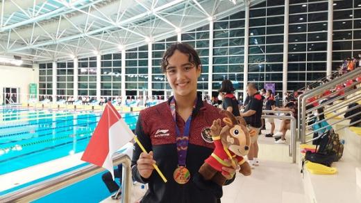 Masniari Wolf Raih Emas Gaya Punggung Putri